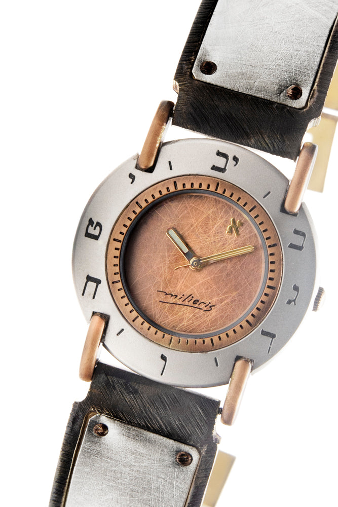Close-up of the brushed copper dial with Hebrew numerals on a large sterling silver watch - ALEPH Luna