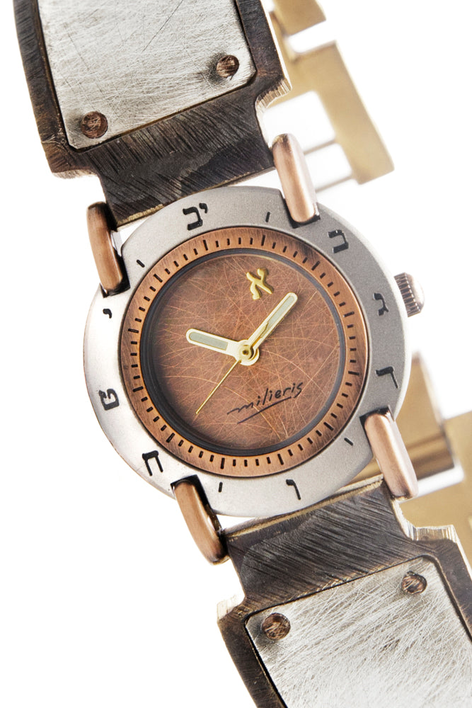 Close-up of brushed copper dial on sterling silver watch with Hebrew numerals – ALEPH Luna