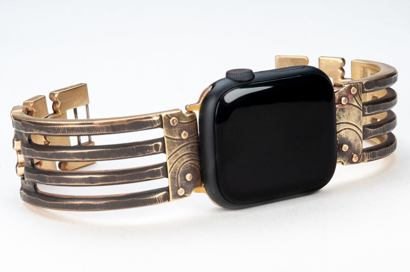 Jaffa Bridge Apple Watch band with Brass. A heavy-duty, solid brass, forked band trimmed with a spiral design.
