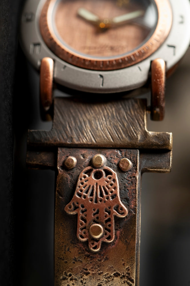 Hamsa talisman riveted to narrow brass band on handcrafted watch – ALEPH Hamsa