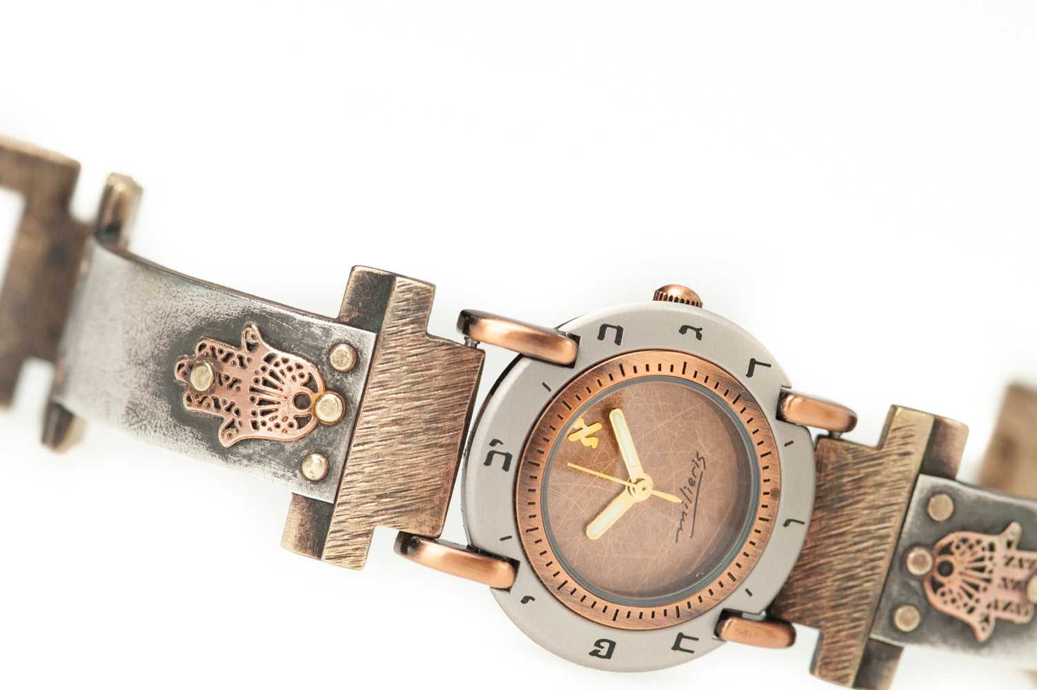 Close-up of brushed copper dial with Hebrew numerals on silver watch band – ALEPH Hamsa