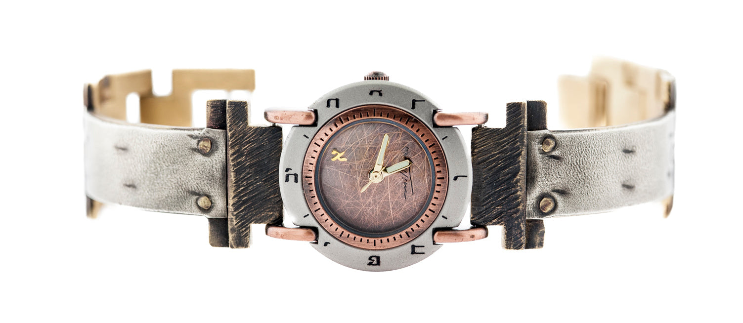 Artisan-made sterling silver watch with brushed copper dial and Hebrew numerals marking the hours. Note the gold Aleph on the dial - ALEPHS